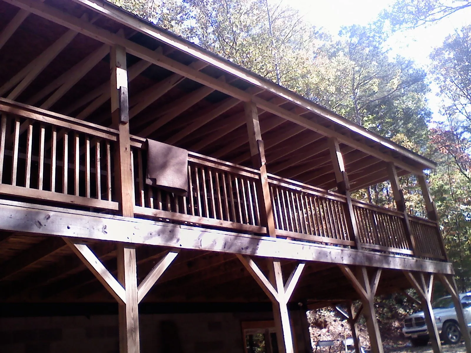 Timber framing under a new elevated porch and deck — Roof Leak Repair in Drain by Roofing Brothers